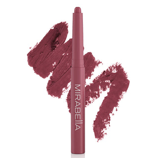 Image of Mirabella's bold Velvet Lip Crayon matte lip pencil shown upright in shade Forever with large shade swatch behind the pencil.