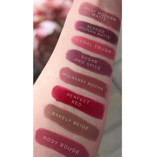 An image showcasing Mirabella's Sealed with a Kiss Lipstick Shades on arm for color reference.